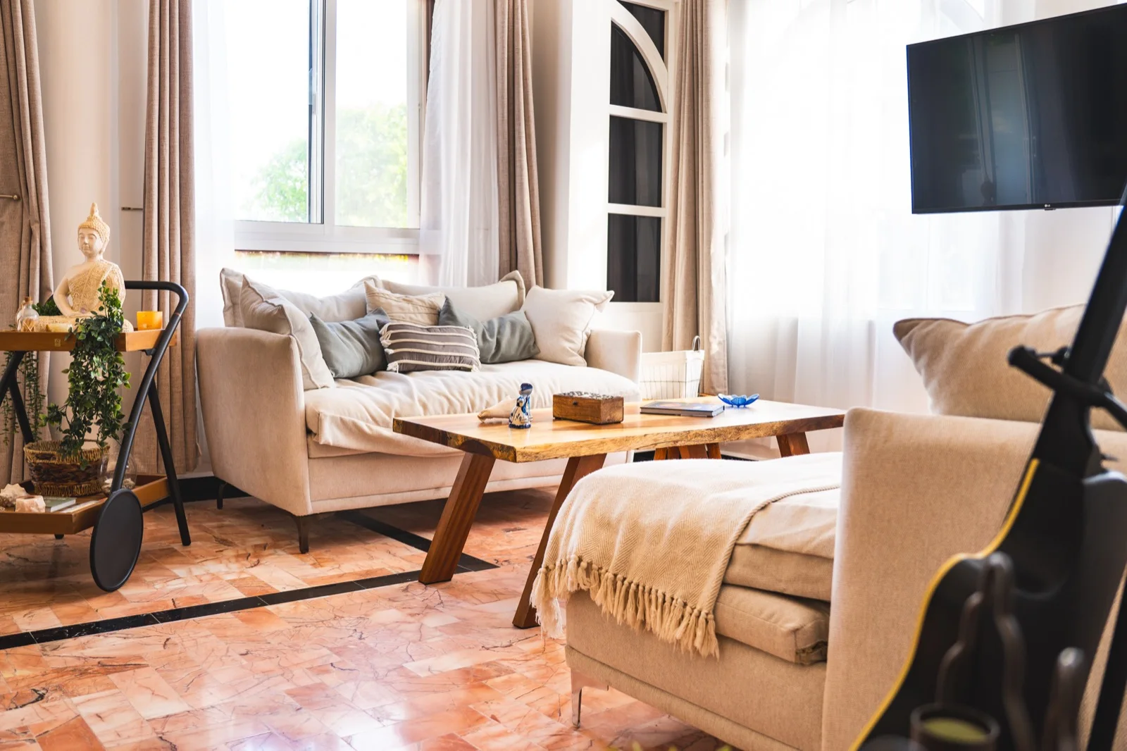 Living room with linen sofas and warm light