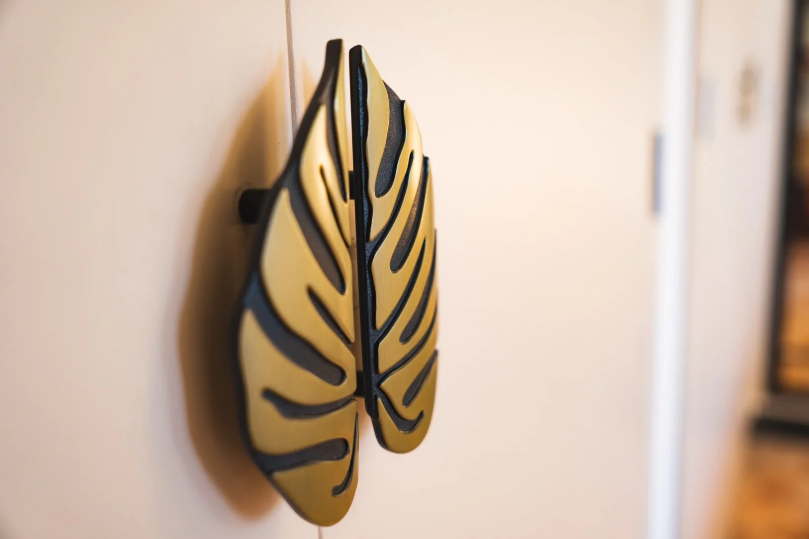 Gold monstera leaf wall sculpture