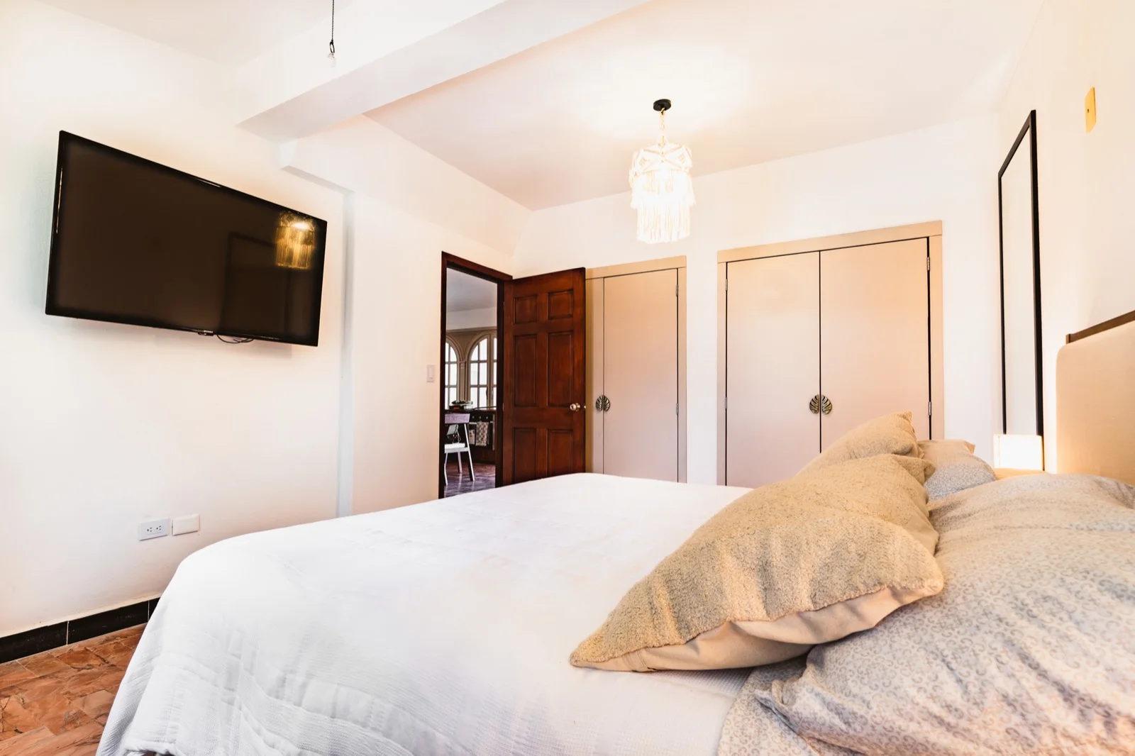 Master bedroom with stained glass windows